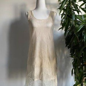 Lush lace dress with layered fringe.